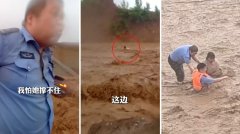 中国女子被困洪流无法脱身 胖辅警挺身救人
